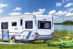 Touring caravans are towed by cars and 'live' on various pitches.